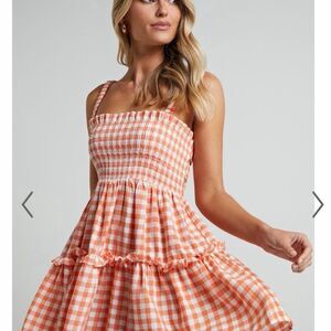 SHOWPO WILDA MINI DRESS - SHIRRED TIERED DRESS IN ORANGE Size 2